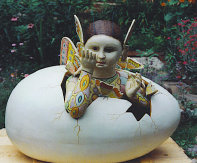 A restored monumental Sergio Bustamante sculpture. Universal Fine Art Conservation restored the broken butterfly wings that were attached 
to the head of the girl emerging from an egg.