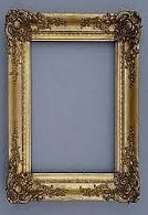 A restored museum giltwood frame