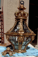 A restored Poseidon giltwood chandelier