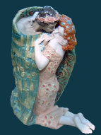 A restored Lladro porcelain sculpture titled The Kiss